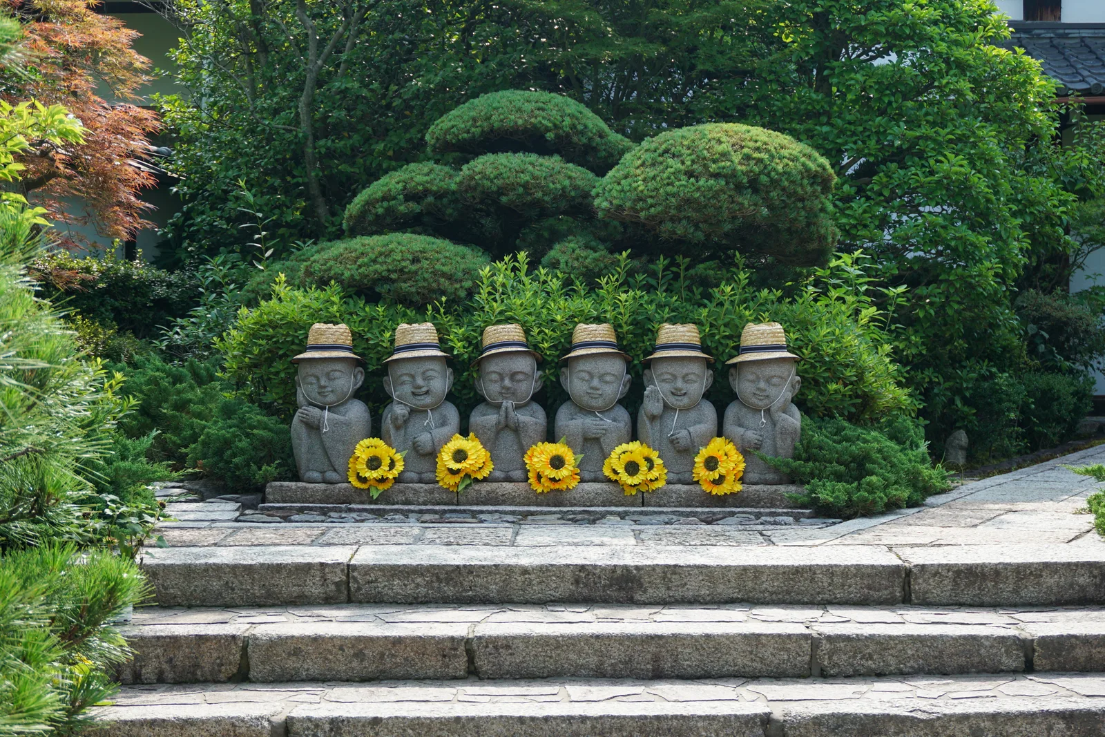 Rokujizo stone statues beside a path at Tofuku-ji Temple