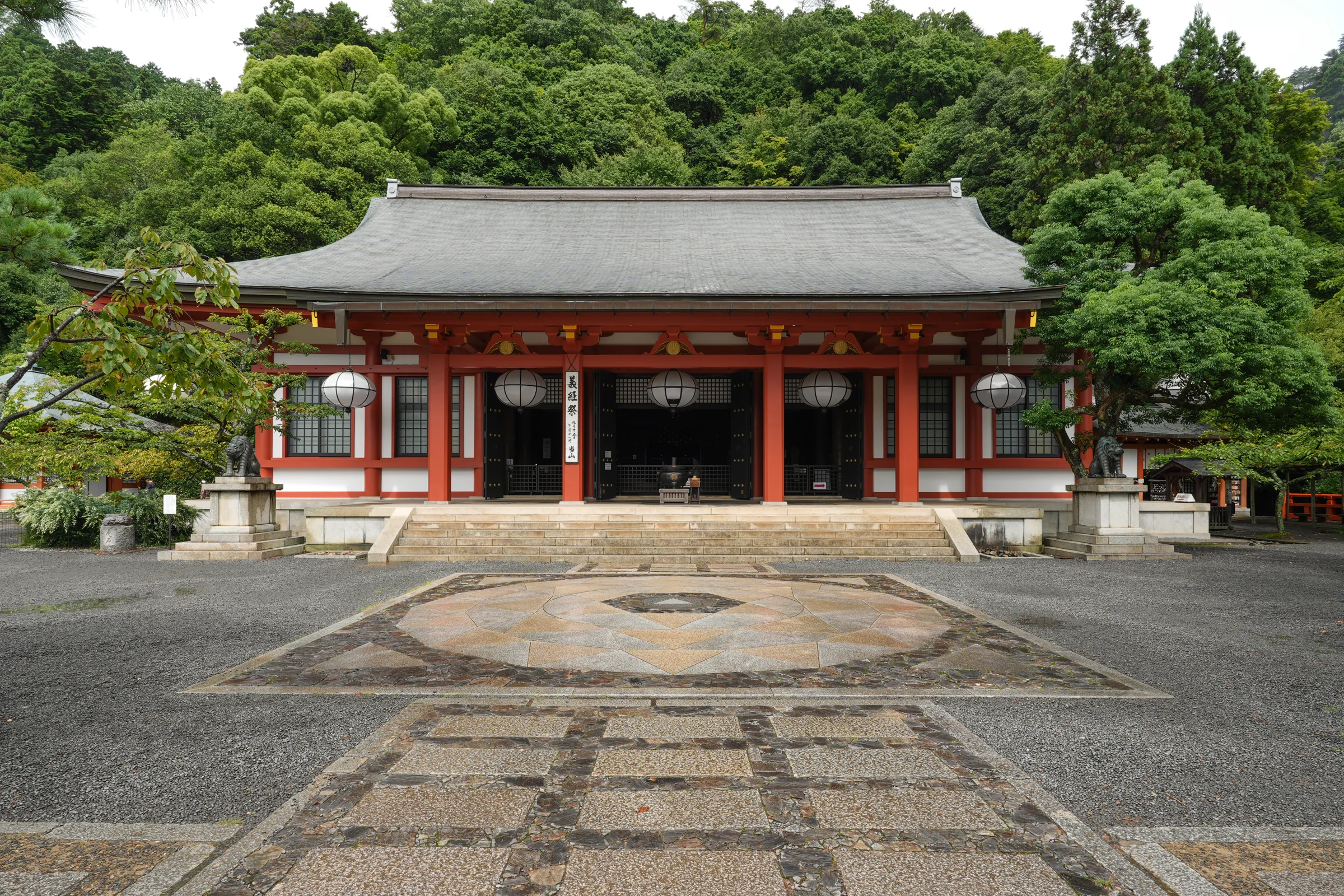 Kurama-dera Temple's main hall and stone courtyard.