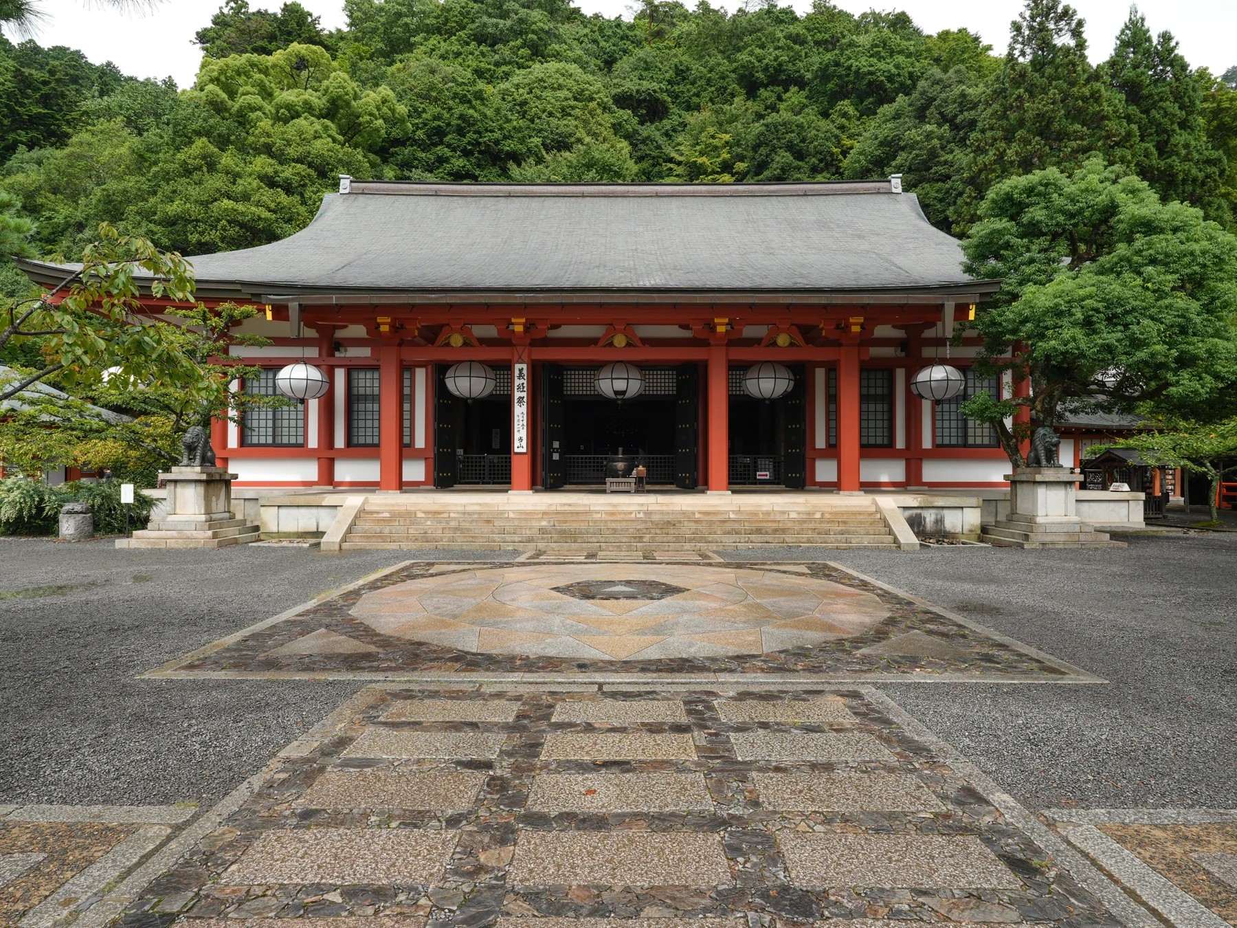 Kurama-dera Temple's main hall and patterned stone courtyard.
